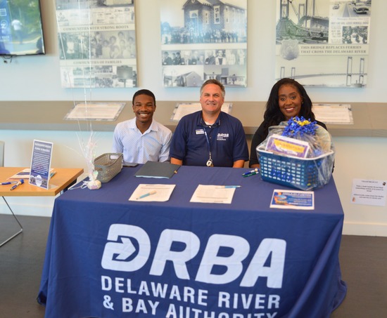 DRBA employees at their booth at the job fair