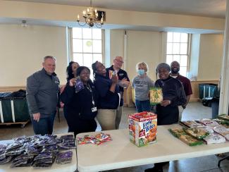 DRBA employees gathered at the St. Patrick's Center