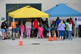 People attend the Take Flight with AVI event at Wilmington Airport ILG September 27 2025